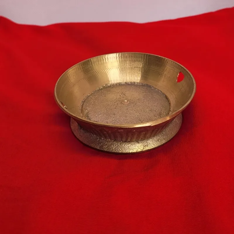 Hammered brass puja plate on a fluted foot